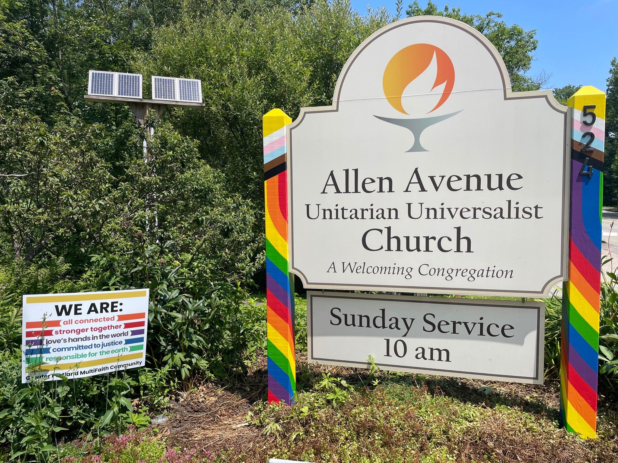 The A2U2 sign on Allen Avenue, painted with the Progress Pride flag